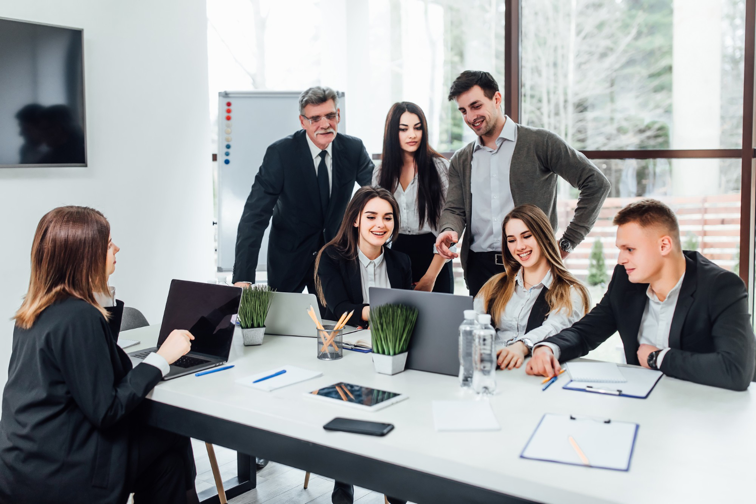 staff-meeting-group-young-modern-people-smart-casual-wear-discussing-something-while-working-creative-office-business-time